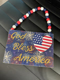 Patriotic Wooden Hanging Sign – “God Bless America”